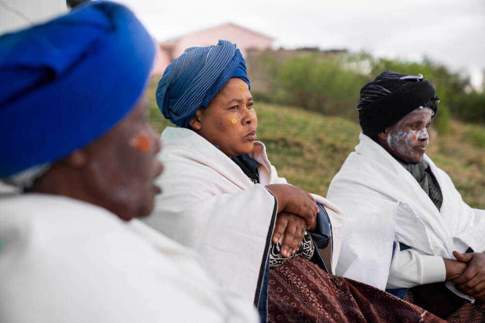A group of empowered women in Uganda working on income-generating projects.